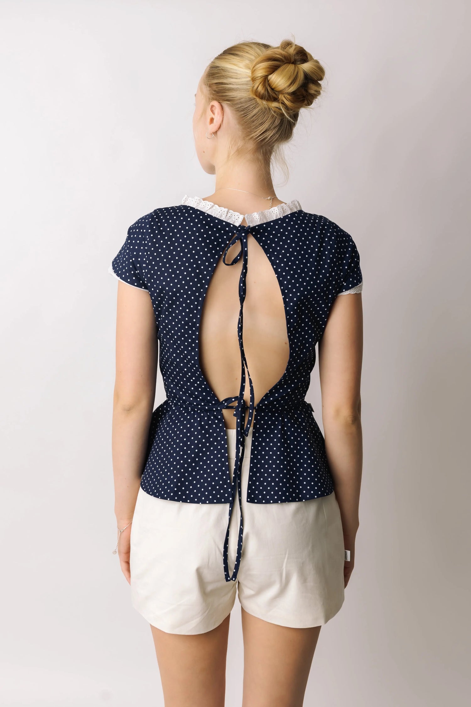 Open Back Polka Dot Peplum Top prettied